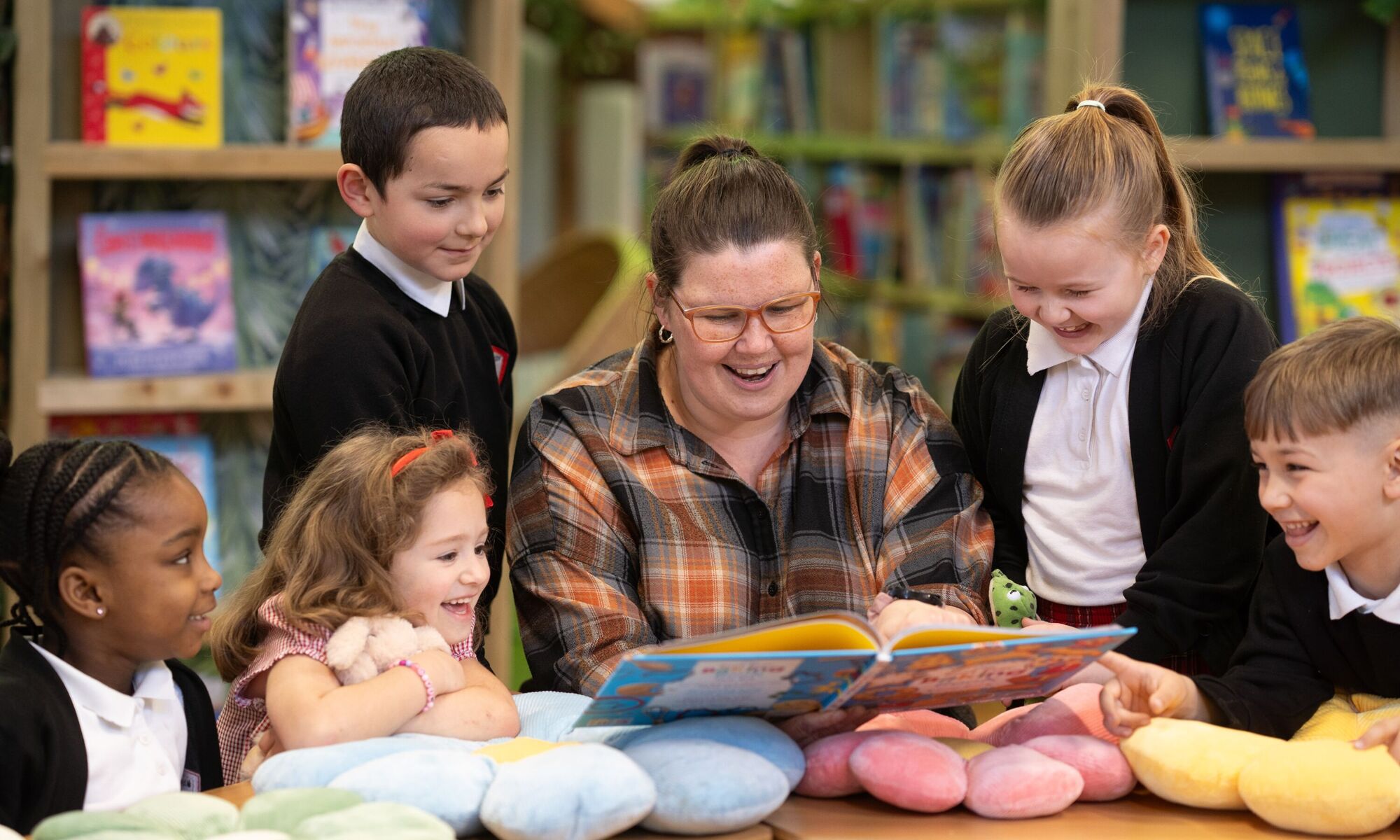 TKAT Trust Teacher Working with Students